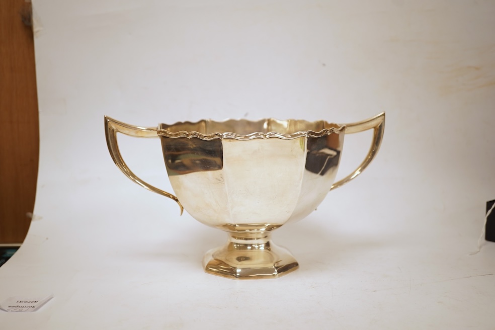 An Edwardian silver two handled pedestal presentation bowl, by Horace Woodward & Co, London, 1980, with later engraved inscription, height 12.7cm, 15.9oz.